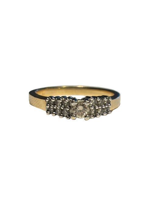 Ladies diamond step ring, graduating diamonds 14k yellow gold setting